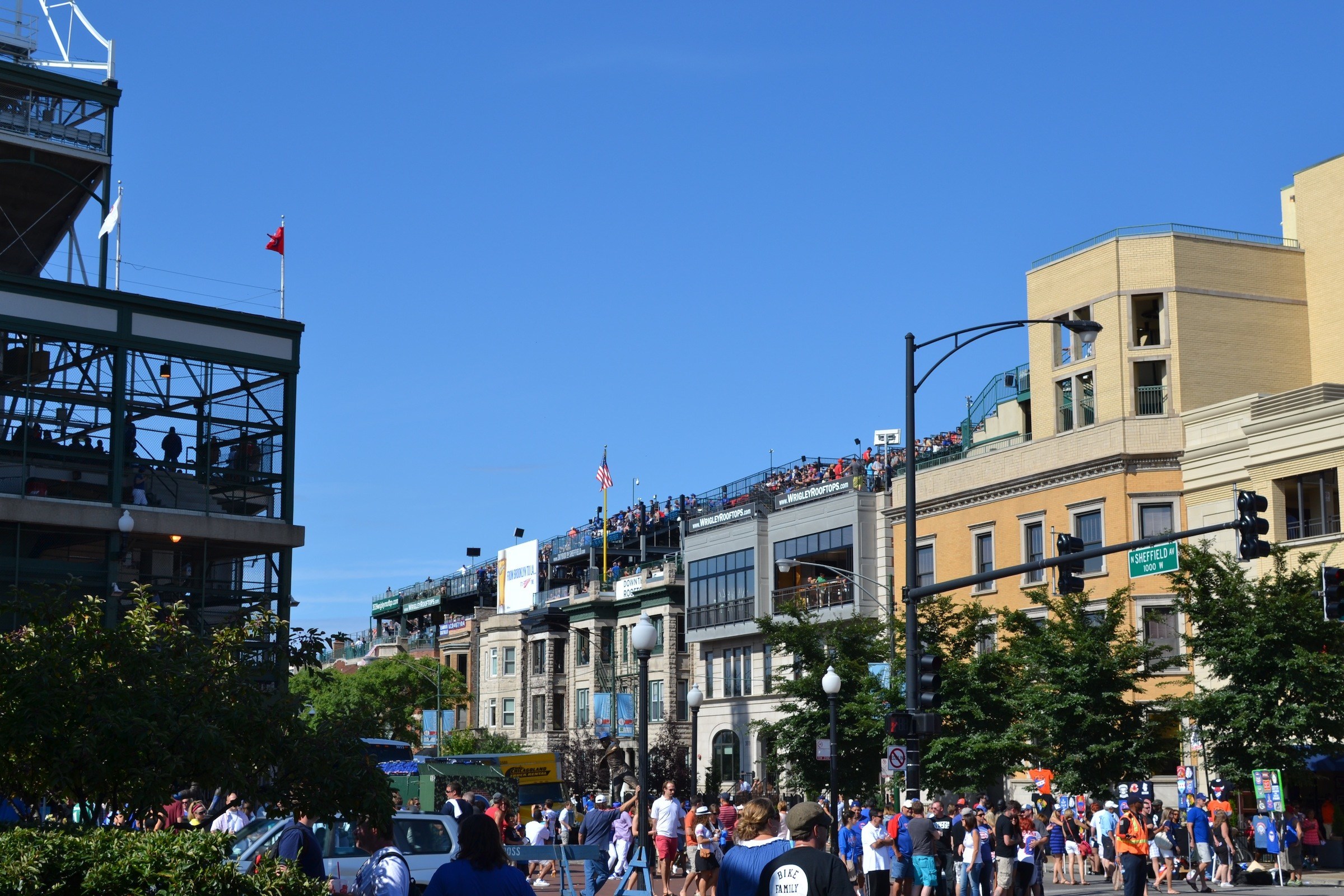 Good idea, watching the game from the roof!